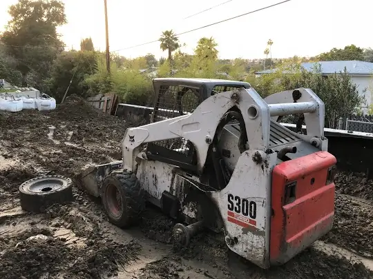 work accident lawyer construction worker Bobcat